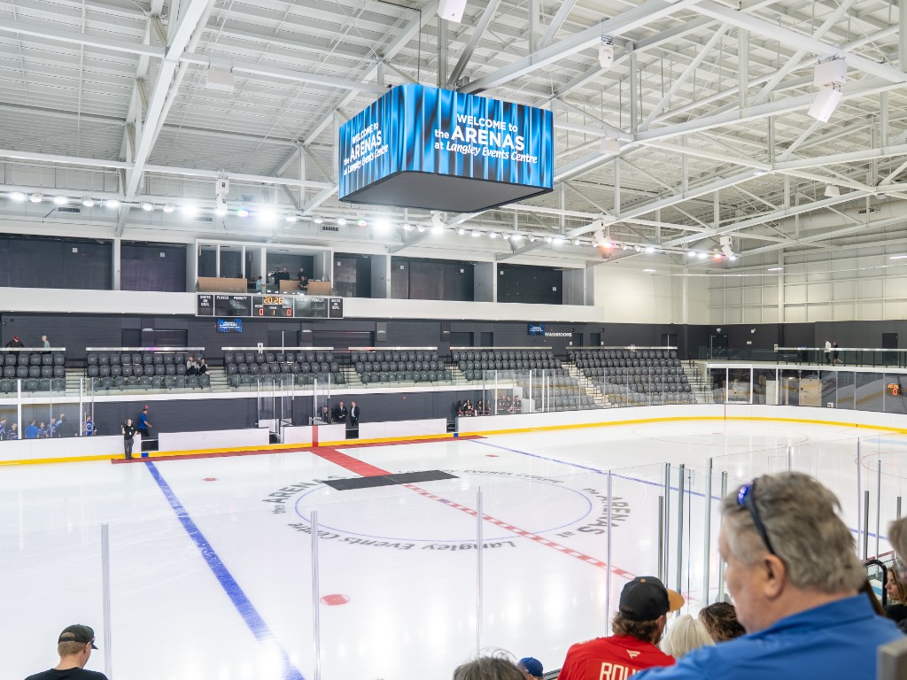 Interior of the ARENAS at Langley Events Centre with the welcome jumbotron lit