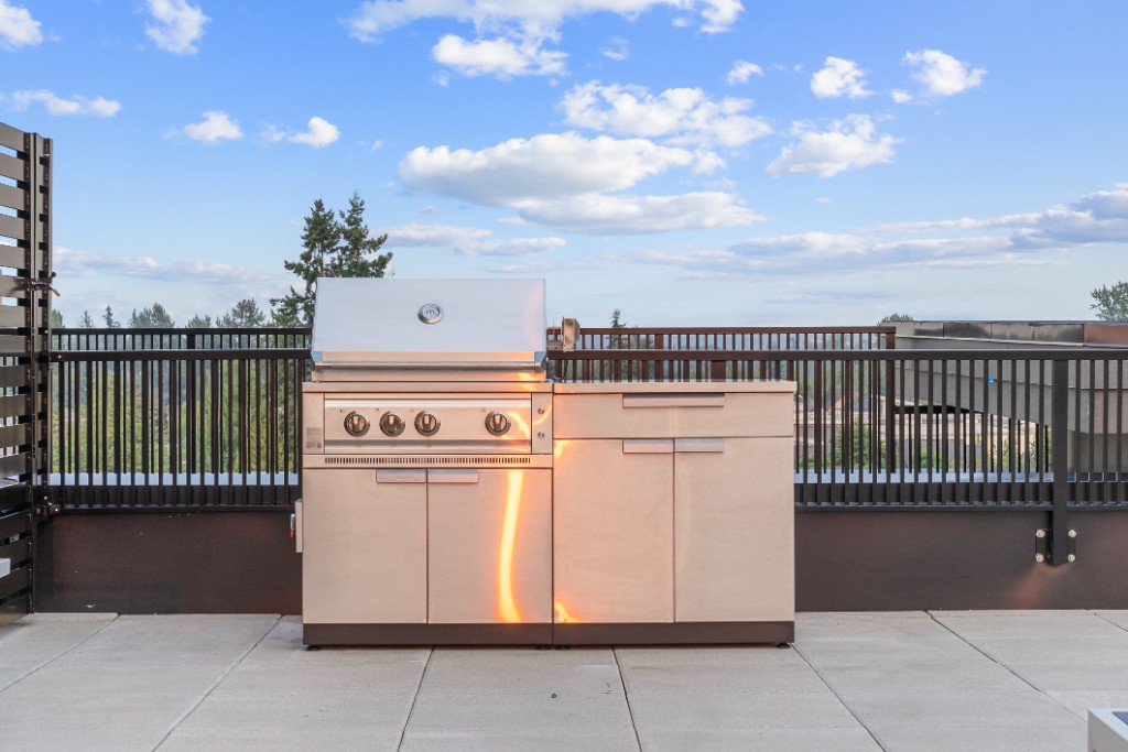 Stainless steel BBQ on the rooftop amenity deck at The Commons condos in Willoughby, Langley