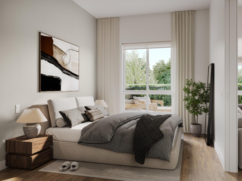 Bedroom with a balcony view in the condos at Atlin and Bute at Clayton Crest, West Clayton, Surrey